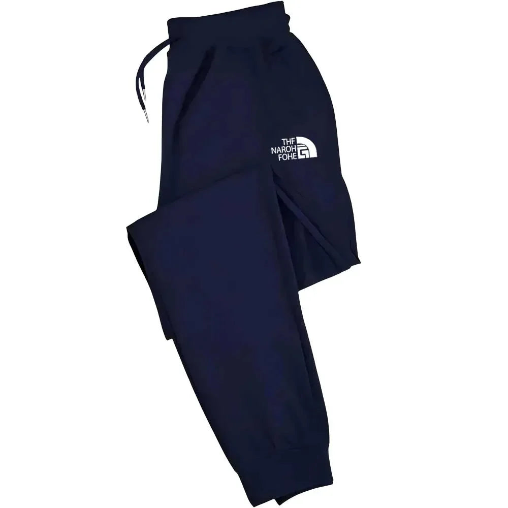 Men's casual running pants with elastic drawstring at the waist and loose printed sports pants with cuffs at the ankles