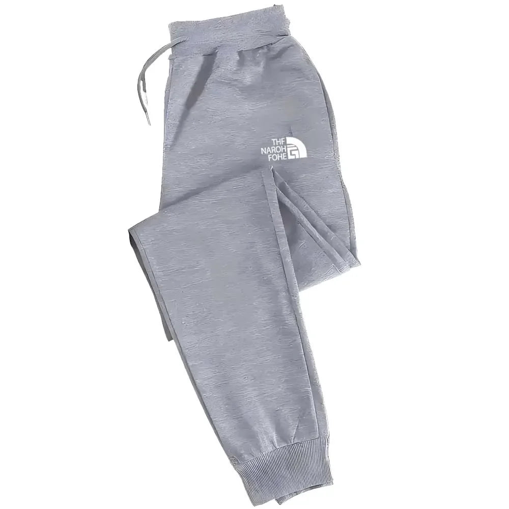 Men's casual running pants with elastic drawstring at the waist and loose printed sports pants with cuffs at the ankles