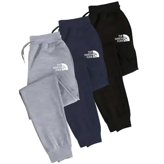 Men's casual running pants with elastic drawstring at the waist and loose printed sports pants with cuffs at the ankles